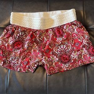 Stretchy colorful shorts. Excellent condition. Size medium. Has pockets.